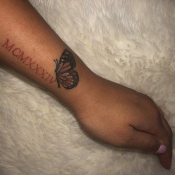 Latin Skulls - Butterfly tattoo with Roman numerals - Tattoo Near Me - Pico Rivera, California Latin Skulls - Butterfly tattoo with Roman numerals - Tattoo Near Me - Pico Rivera, California