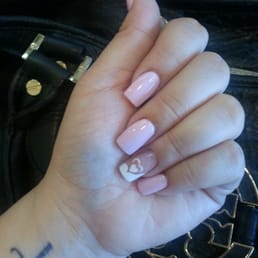 Fill with a pink gel color plus air brushed designs on my ring finger! Thanks Cindy! She's the best!