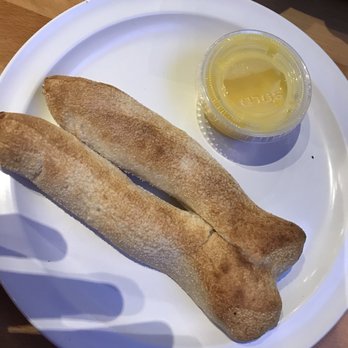 Noble Roman's Craft Pizza & Pub - Breadsticks and garlic butter - Pizza Near Me - Westfield, Indiana Noble Roman's Craft Pizza & Pub - Breadsticks and garlic butter - Pizza Near Me - Westfield, Indiana