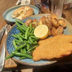 Zizzi - The main entree item seemed bought in bulk, and heated on site. The garlic bun at top of pic, was a small dollop of garlic in a bun.