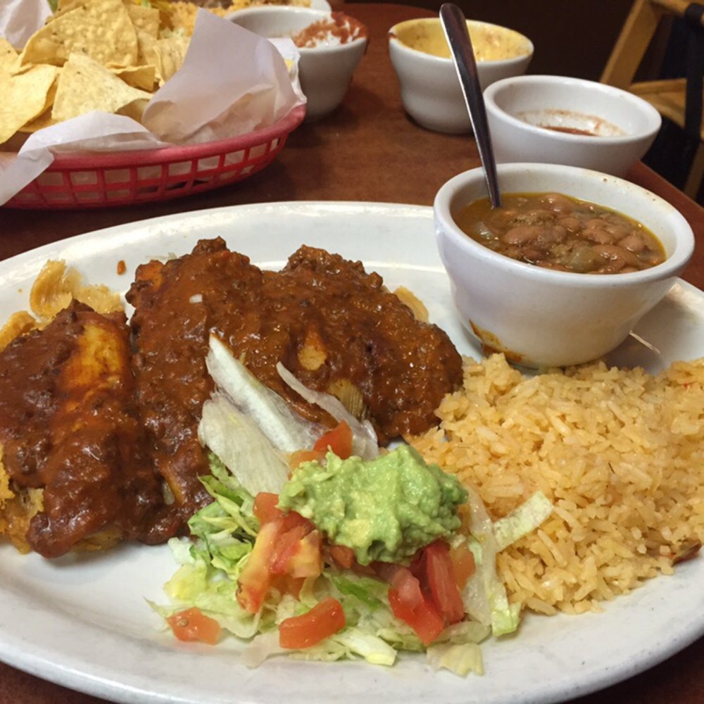Tamale with chili meat on top Tamale with chili meat on top