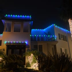 The pop of blue & green alternating LEDs capture this modern homes beauty.