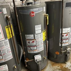 Tibets Plumbing & Heating - The water heater after replacing (middle)