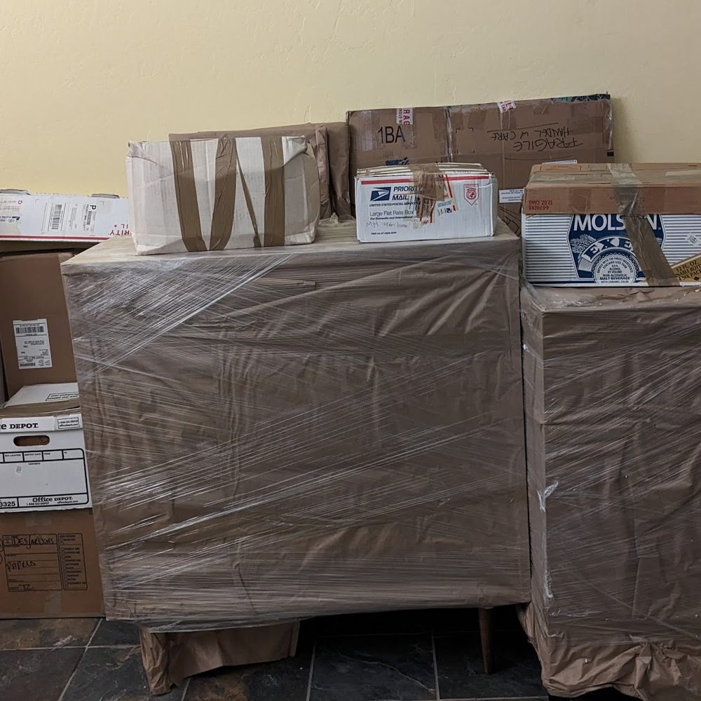 Clear Out Enterprises - Marcos separated the two lots of boxes with furniture. - Movers Near Me