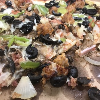 Uncle Howie's Pizza - Combo being devoured - Pizza Near Me - Redlands, California Uncle Howie's Pizza - Combo being devoured - Pizza Near Me - Redlands, California