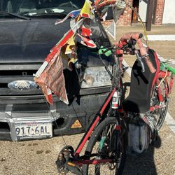 Exterior: my almost ready-to-ride "FrankenBike" is leaning on the port bow of my (motor)vehicle, parked in front of my ground-floor room