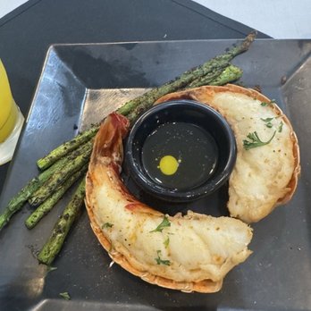 The 4 Seasonings - Lobster shrinking away from the shell, overcooked rubbery on tapered end. - Seafood Near Me - Antioch, California
