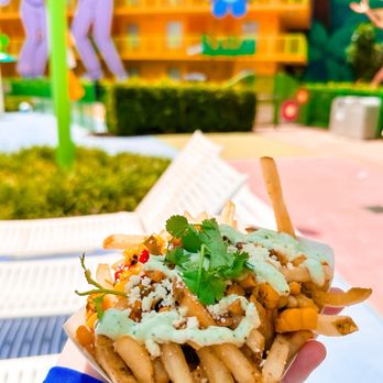 Pop Century - Loaded Street Corn Fries, 6/10. These loaded fries are so inconsistent throughout property - Breakfast & Brunch Near Me - Azalea Park, Florida Pop Century - Loaded Street Corn Fries, 6/10. These loaded fries are so inconsistent throughout property - Breakfast & Brunch Near Me - Azalea Park, Florida