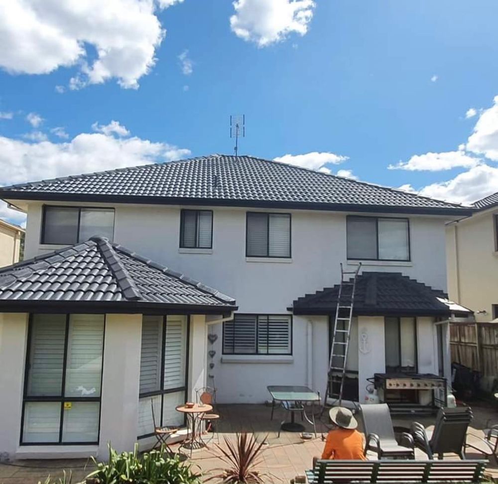Slide of Olive Tree Roofing and Construction