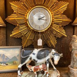 A Piece of the Past - 1960s sunburst wood carved gilt clock.