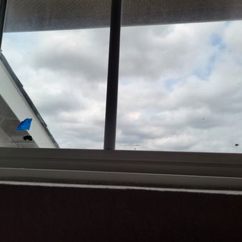 Chesmar Homes - Tar like substance on the window from more Chesmar slop. - General Contractors Near Me - Pflugerville, Texas