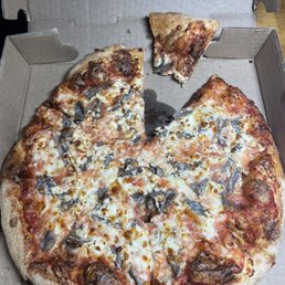 Small cheese pizza with extra cheese, extra feta cheese and extra anchovies