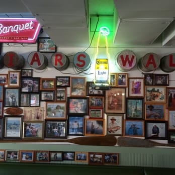 Flying Fish - The wall of amateur and pro lying fisherman lol - Cajun/Creole Near Me - Fort Worth, Texas