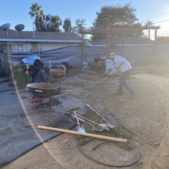 Rimpau Landscaping and Maintenance - two men working on a patio - Landscaping Near Me - Los Angeles, California