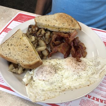 Breakfast Station - Eggs over easy, rye toast, bacon strips, and home fries - Breakfast & Brunch Near Me - Spring Hill, Florida