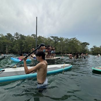 Morrison Springs - People on the floating dock and the springs - Parks Near Me - Ponce de Leon, Florida