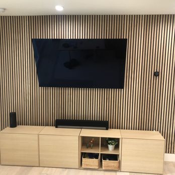 Wolf Construction - Natural Oak Acoustic Slat Wood Wall Panels - General Contractors Near Me