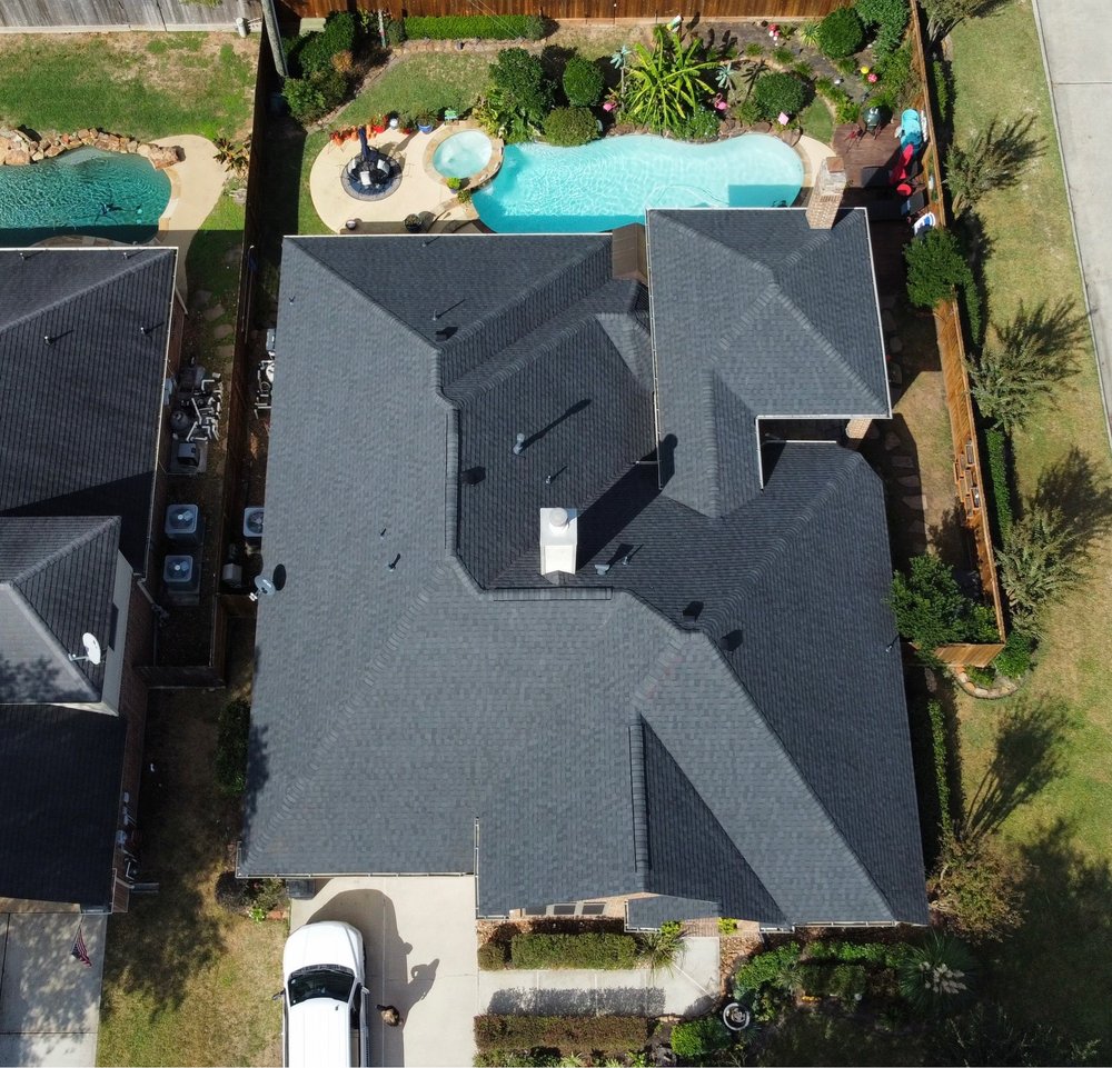 Slide of REAL Roofing and Construction