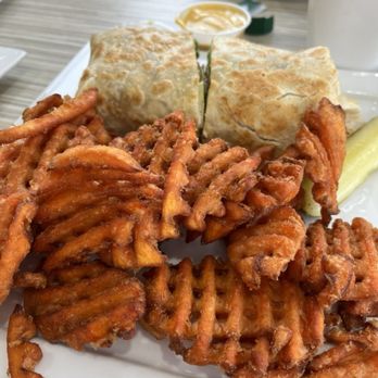 Biscuits And Gravy - Sweet potato fries and a chicken, avocado wrap sandwich.  The serving was huge and I ended up taking half home. - Salad Near Me - Clawson, Michigan