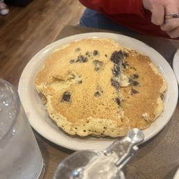 Plate sized pancakes of the blue berry variety. Man! I love this place.