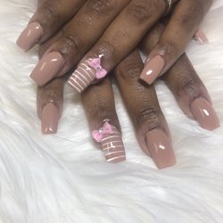 Divine Designz Nail Salon & Cosmetics