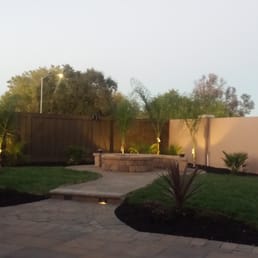 Fire pit patio and gas pit with seating bench. Fire pit patio and gas pit with seating bench.