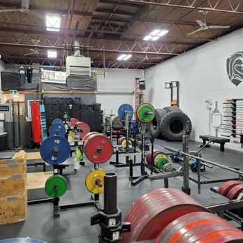 Iron Throne Strength and Conditioning - Bench/squat rack area + plate racks - Gyms Near Me - Surrey, British Columbia Iron Throne Strength and Conditioning - Bench/squat rack area + plate racks - Gyms Near Me - Surrey, British Columbia