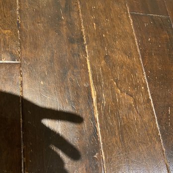 Marett Carpet One Floor & Home - a shadow of a hand on a hardwood floor - Carpeting Near Me - Volant, Pennsylvania Marett Carpet One Floor & Home - a shadow of a hand on a hardwood floor - Carpeting Near Me - Volant, Pennsylvania