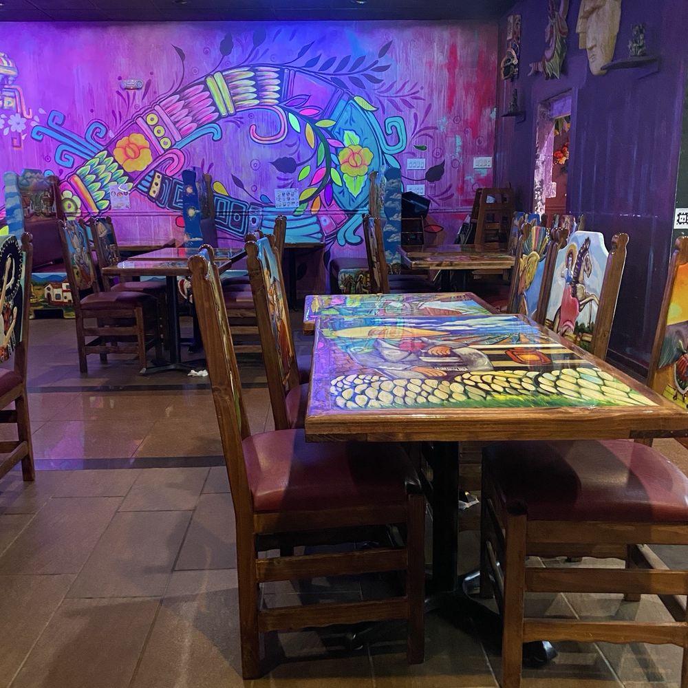 Just one shot of the area of the restaurant where we sat. The whole restaurant has great art work from the walls to the tables and seating.
