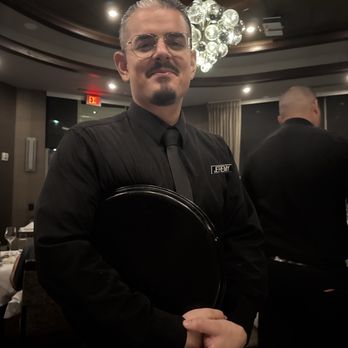 Ruth's Chris Steak House - Our handsome server! - Steakhouses Near Me - Pasadena, California Ruth's Chris Steak House - Our handsome server! - Steakhouses Near Me - Pasadena, California