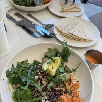 Flower Child - Two Mother Earth bowls one with Steak and other no meat. Pita bread on the side - Salad Near Me - Fort Worth, Texas Flower Child - Two Mother Earth bowls one with Steak and other no meat. Pita bread on the side - Salad Near Me - Fort Worth, Texas