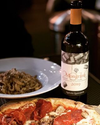 Photo of Trenta Pizza & Cucina - Costa Mesa, CA, US. Tagliatelle al Brasato (short rib pasta) and Reggio Calabria pizza. Delicious!