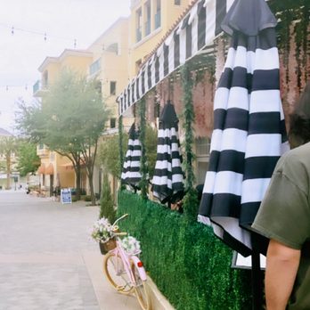 Mrs Coco - The outside near to the outside patio and a bike with flowers as decor - Cafes Near Me - Henderson, Nevada Mrs Coco - The outside near to the outside patio and a bike with flowers as decor - Cafes Near Me - Henderson, Nevada