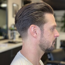 Men's haircut with taper by owner Bryan
