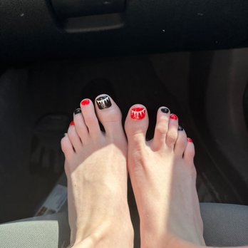 My Nails & Spa - Red and black toenails with a white red and silver glittery crown - Nail Salons Near Me - Post Falls, Idaho My Nails & Spa - Red and black toenails with a white red and silver glittery crown - Nail Salons Near Me - Post Falls, Idaho