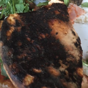Legno Chicago - Burnt crust on the bottom of our pizza - Italian Near Me - Chicago, Illinois