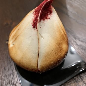 Cannelle Patisserie - Lemon custard or curd with raspberry inside a meringue. Has a cake of some type to hold it together. - Coffee & Tea Near Me - Birmingham, Michigan Cannelle Patisserie - Lemon custard or curd with raspberry inside a meringue. Has a cake of some type to hold it together. - Coffee & Tea Near Me - Birmingham, Michigan