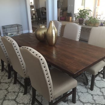 Ashley Store - This our solid Mango wood dining table with linen padded/studded chairs and great area rug. We love it!!! - Furniture Stores Near Me - Folsom, California Ashley Store - This our solid Mango wood dining table with linen padded/studded chairs and great area rug. We love it!!! - Furniture Stores Near Me - Folsom, California