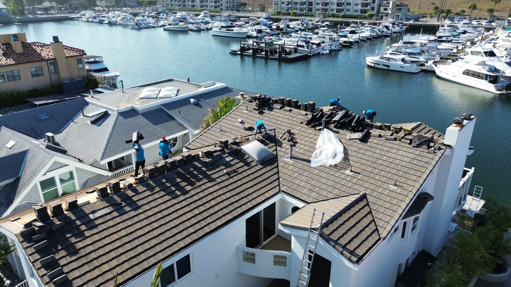 Slide of iHeart Roofing