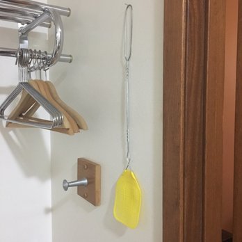 Crest Country Inn - Fly setter hung in bathroom - Hotels Near Me - Williamsburg, Iowa