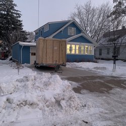 Eric's Moving and Delivery Service - 2 of the 4 Packed-to-the-gills U Haul Pods Eric's Moving helped us unload on a frosty Viroqua morning!