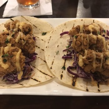 Second Line Sports Edition - Fried Oyster Tacos. More of a meal than a starter... 3 per plate. - New American Near Me - Kenner, Louisiana Second Line Sports Edition - Fried Oyster Tacos. More of a meal than a starter... 3 per plate. - New American Near Me - Kenner, Louisiana