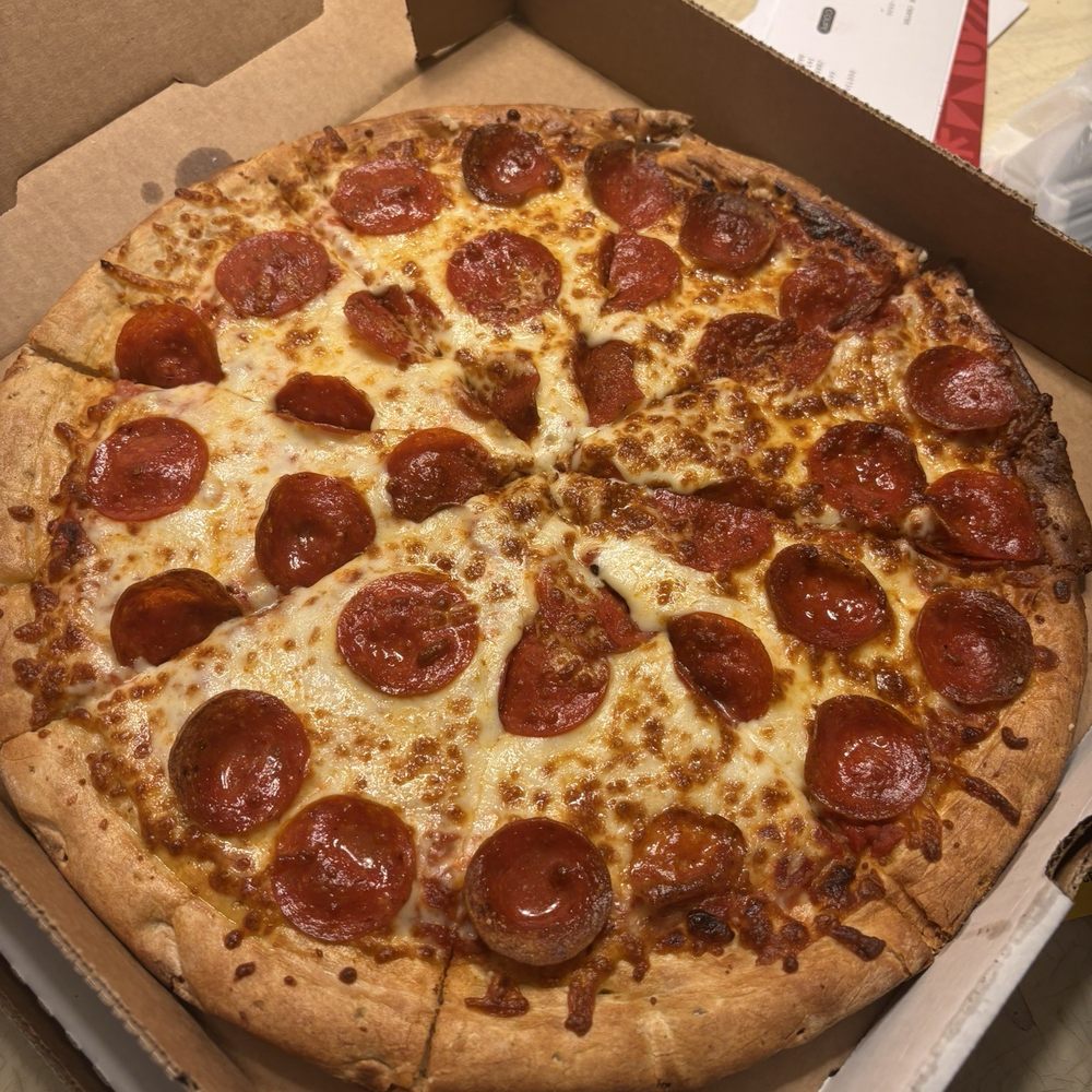 This is just one of the pepperoni & cheesy goodness! And that perfect burnt crust. Love it.