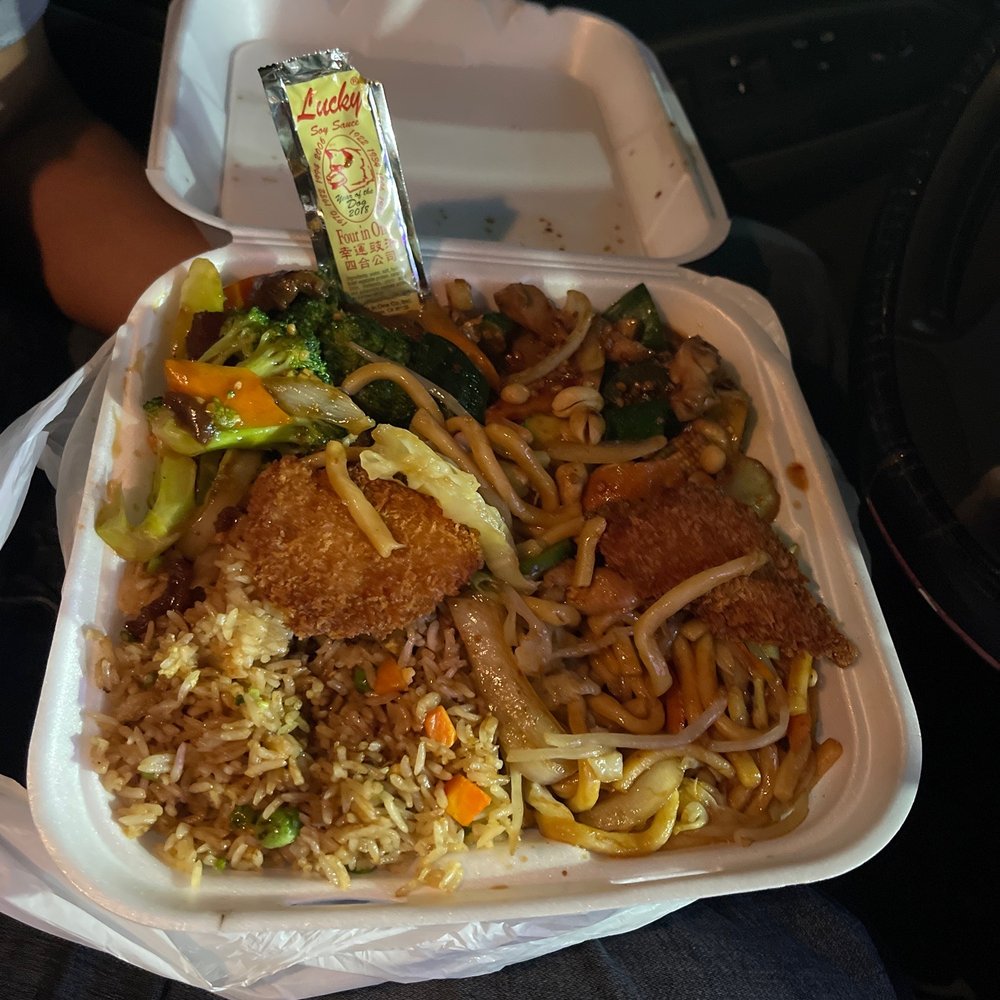 a take out container of chinese food a take out container of chinese food