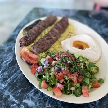 Kobee Factory - a plate of food on a table - Middle Eastern Near Me - Van Nuys, California Kobee Factory - a plate of food on a table - Middle Eastern Near Me - Van Nuys, California
