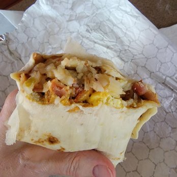 Lisa's Grill - Breakfast burrito with egg, cheese, bacon, potatoes and green chili. - American Near Me - Moriarty, New Mexico