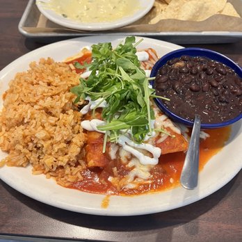 Cruzteca Mexican Kitchen - Blackened shrimp enchiladas, queso (almost all eaten) - Breakfast & Brunch Near Me - Austin, Texas Cruzteca Mexican Kitchen - Blackened shrimp enchiladas, queso (almost all eaten) - Breakfast & Brunch Near Me - Austin, Texas