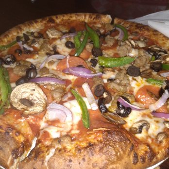 Courtside Pizza - a pizza with mushrooms, peppers, and onions - Pizza Near Me - Athens, Ohio