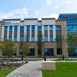 A bright, contemporary exterior view of Bare Dermatology's Frisco location, situated within the Frisco Medical Pavilion II...