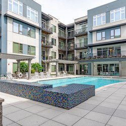 Encore 4505 at Town Center - Colorful tile and fountain accents in luxurious pool